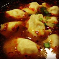 Dumpling in hot and sour soup 酸辣汤饺子